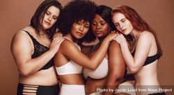 Female models of all body types leaning on each other with eyes closed 5oArGb