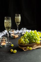 Glasses with wine and grapes