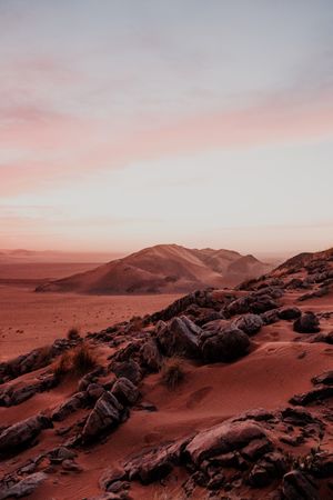 Sunset sky over hills in desert