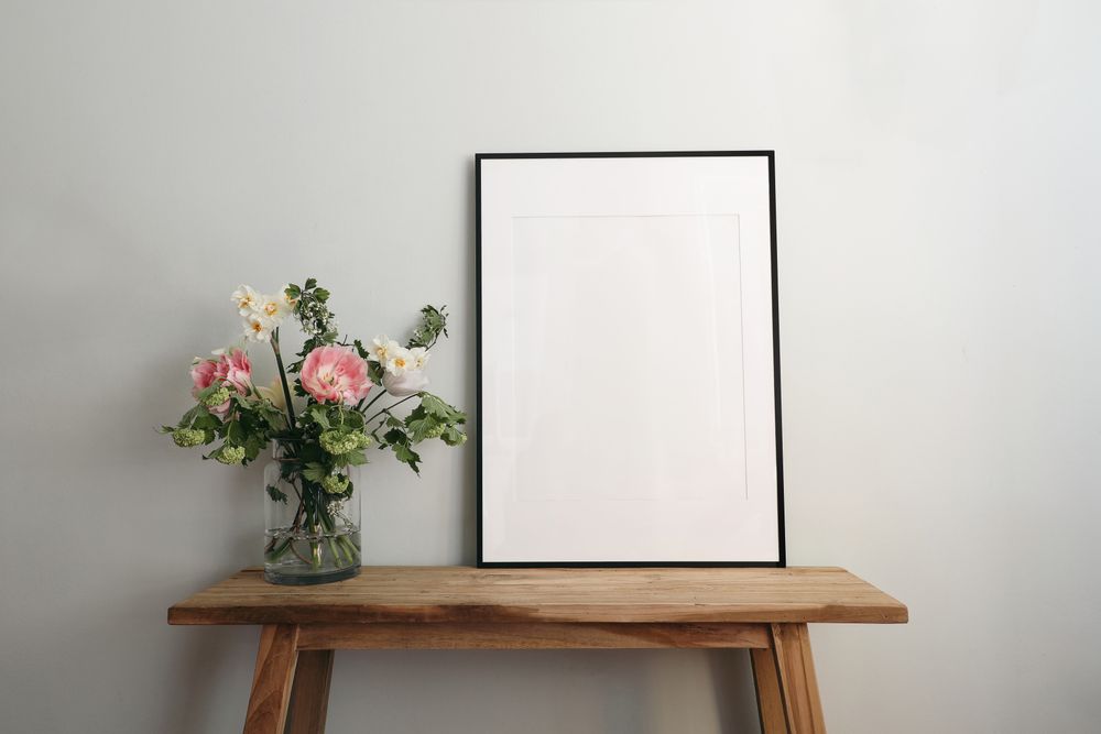 Blank poster on wooden table