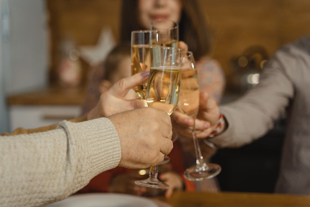 Group of people raising a toast