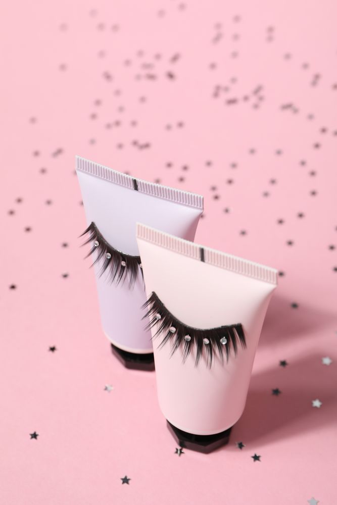 concept of cosmetology tools and beauty treatment, false eyelashes