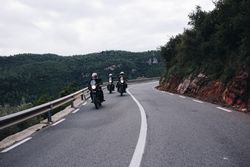 Friends traveling on motorbikes