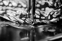 Close up of Indonesian patterned fabric under sewing machine needle