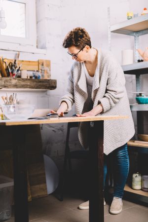 Woman potter making hearts