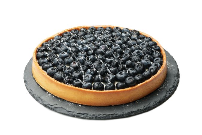 Tray with blueberry pie isolated on light background