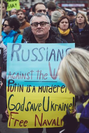 London, England, United Kingdom - March 5 2022: Man with anti-war in Ukraine sign at protest