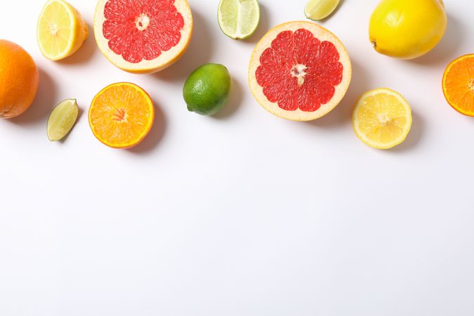 Composition with vegetables and fruits on blank background, space for text