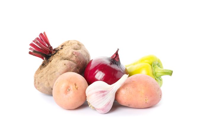 Pepper, potato, garlic, onion and beet isolated on plain background
