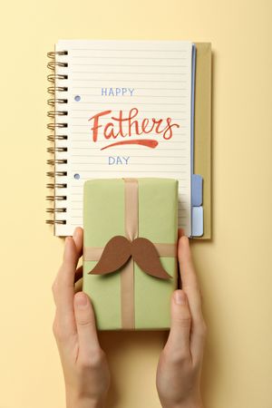 Happy father's day inscription, inscription in notebook, with gifts.