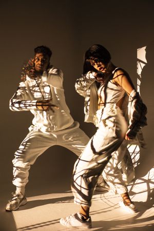 Trendy dancers posing for camera
