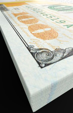 One Hundred Dollar Bills Close-up Abstact.