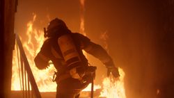 Firefighter runs up The stairs