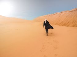 Man walking in desert