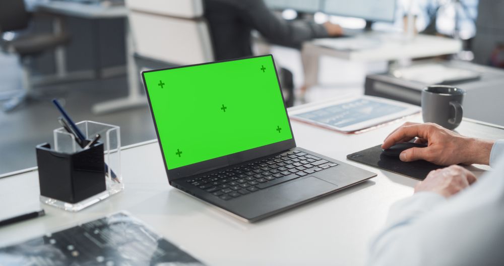 Anonymous Businessperson using Chroma Key Display.