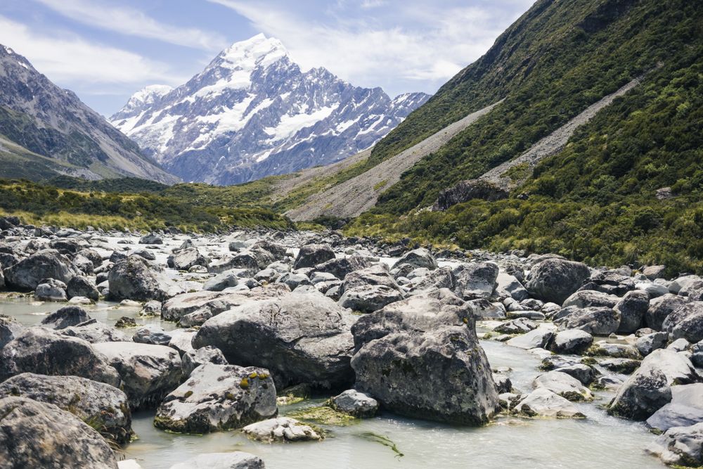 Mountain rocky river and cliffs at New Zealand