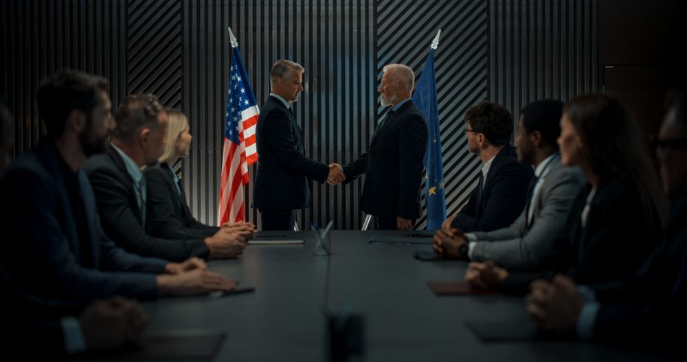 High-Level Political Forum: Two White Male Politicians From United States And European Union Greeting Each Other With Handshake.