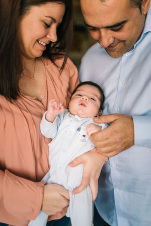 Happy family with newborn baby