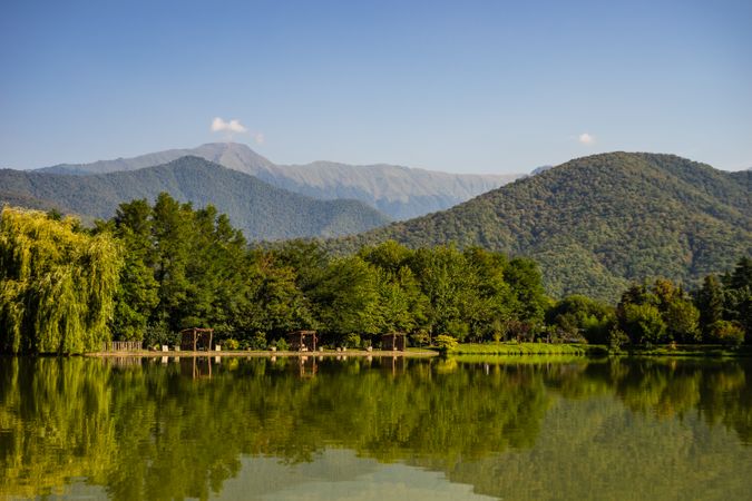 Lopota lake with calm reflection of mountains