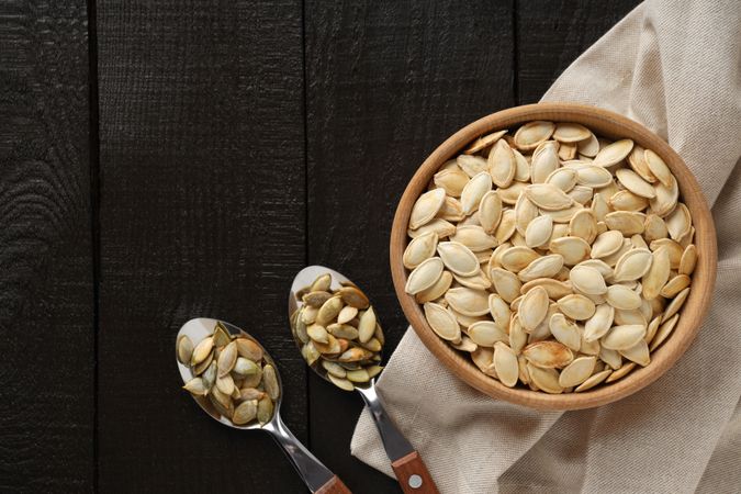 Concept of Autumn vibe food, Pumpkin, Pumpkin seeds, space for text
