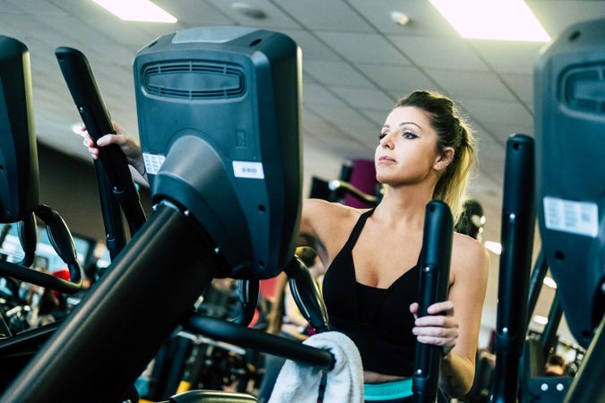 woman on exercise machine