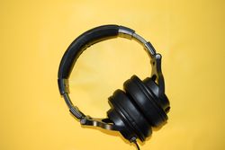 Headphones on yellow table