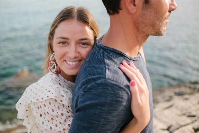 Couple in love embracing on beach