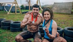 Athletes showing medals after race