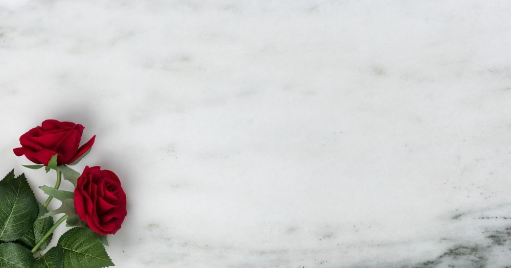 Happy Valentine’s Day with romanic red roses on marble stone background,copy space