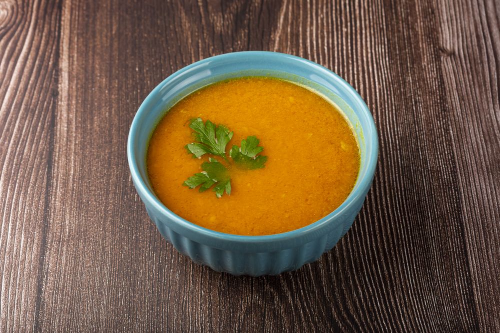 Delicious homemade pumpkin soup in bowl.