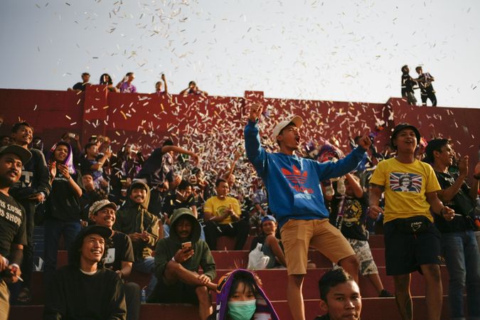 Kedira, East Java Indonesia - October 4, 2019: Fans cheering at soccer game