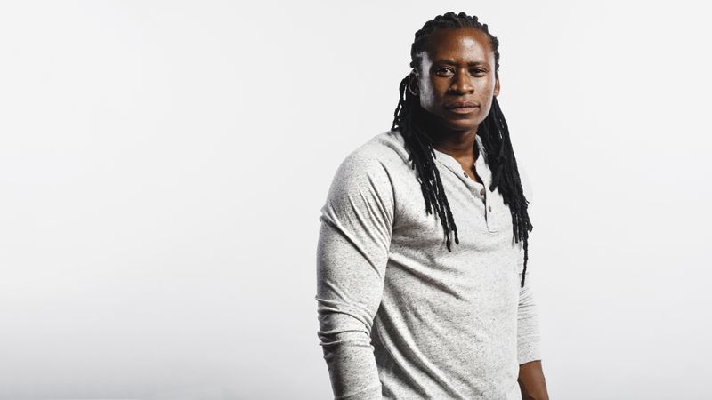 Man with dreadlocks isolated on neutral background