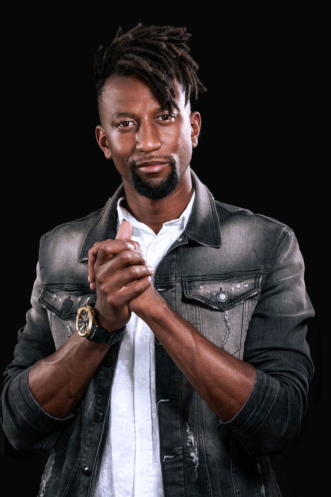 Portrait of Black man wearing jacket