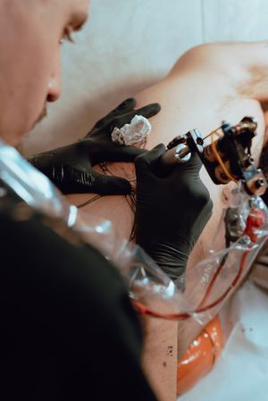 Male client getting tattoo