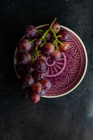 Organic red grape on a plate