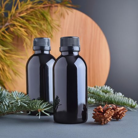 Mockup dark shampoo bottle