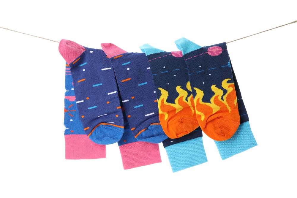 socks with a bright print on the lace, isolated on a light background.