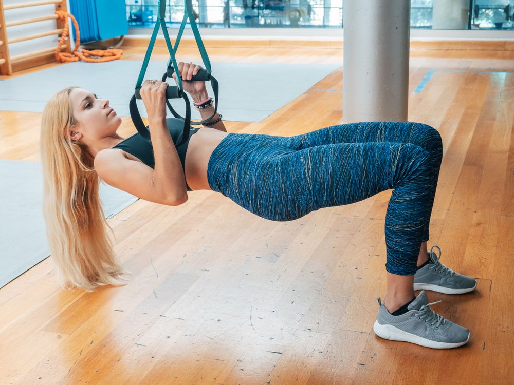 Young female training at the gym