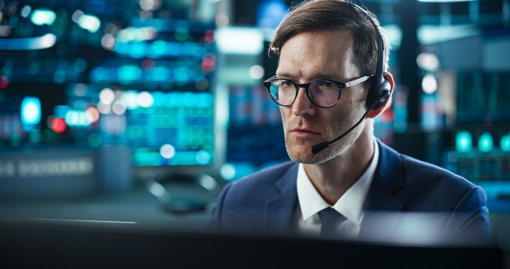Professional Investor Communicating with Business Partners Online.