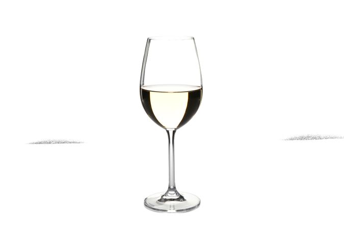 Glass with wine isolated on plain background