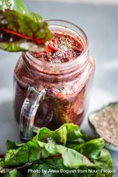 Beet smoothie in mason jar with chia seeds with greens 5or1k0