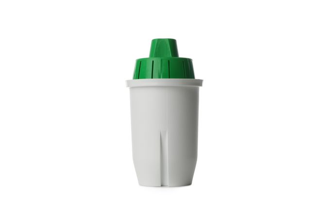 Water filter cartridge isolated on light background