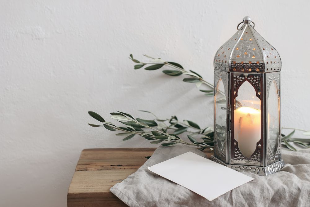 Ornamental silver Moroccan lantern with olive tree branches
