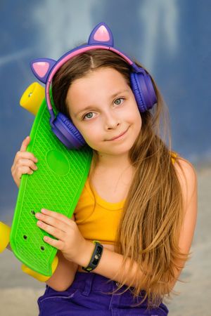Fashionable Girl with Skateboard