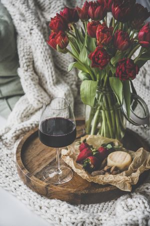Wine and snacks with flowers