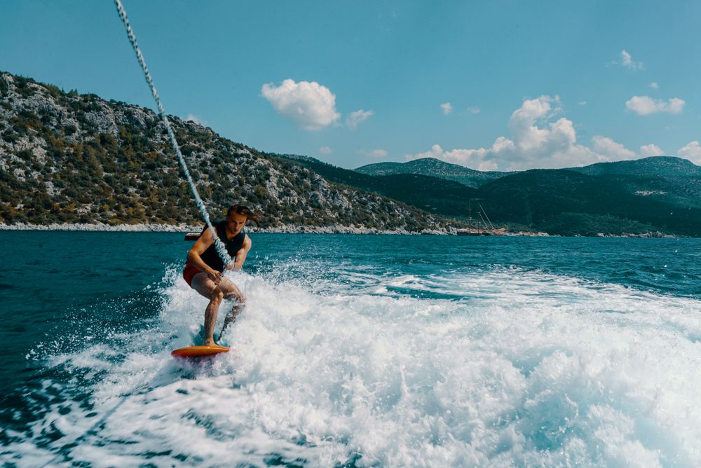 Man wakeboarding in a lake