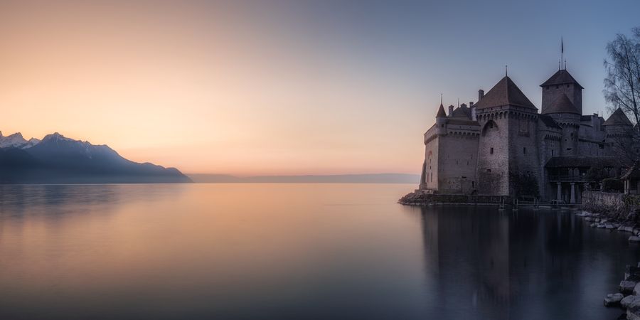 Peaceful landscape of lake in sunset time
