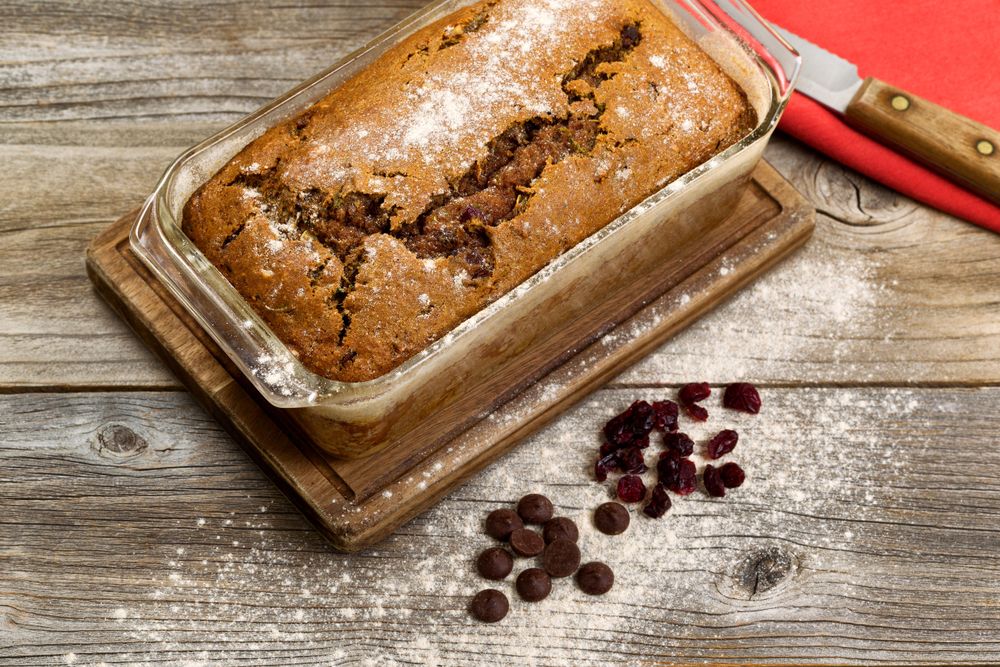 Freshly baked zucchini bread on rustic wood