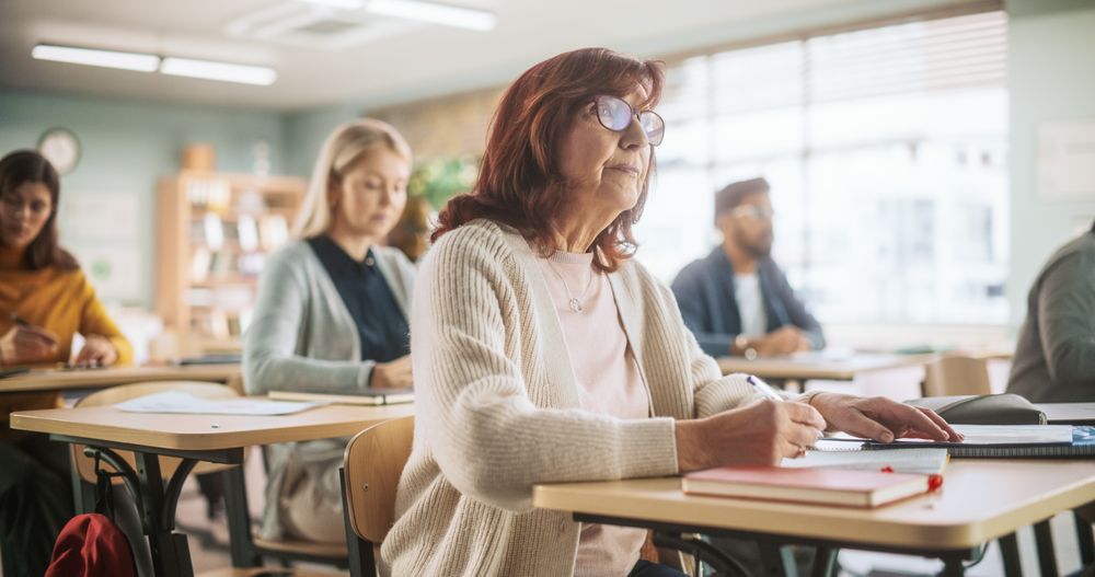 Portrait of a Happy Mature Woman Taking a Course in an International Adult Education Center.
