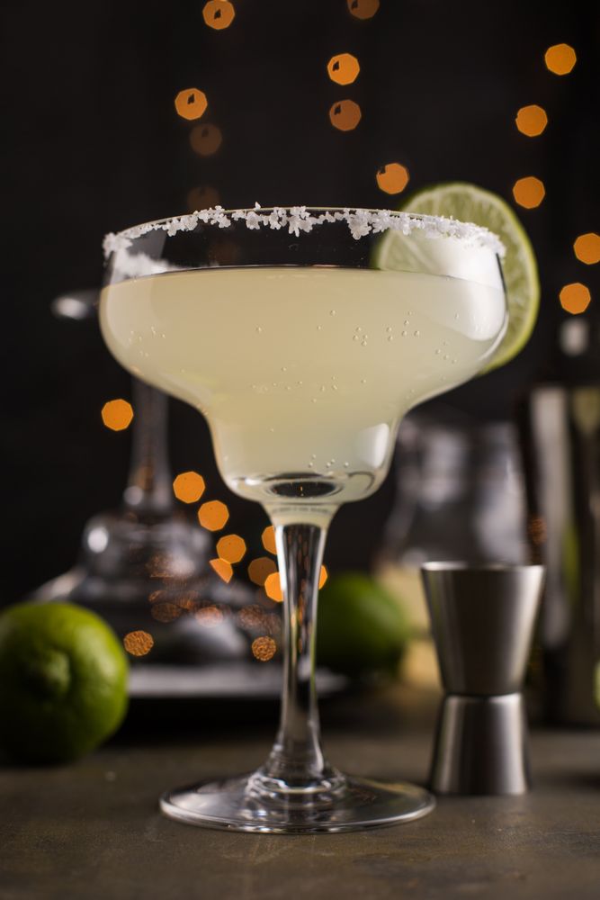 Preparing a margarita cocktail
